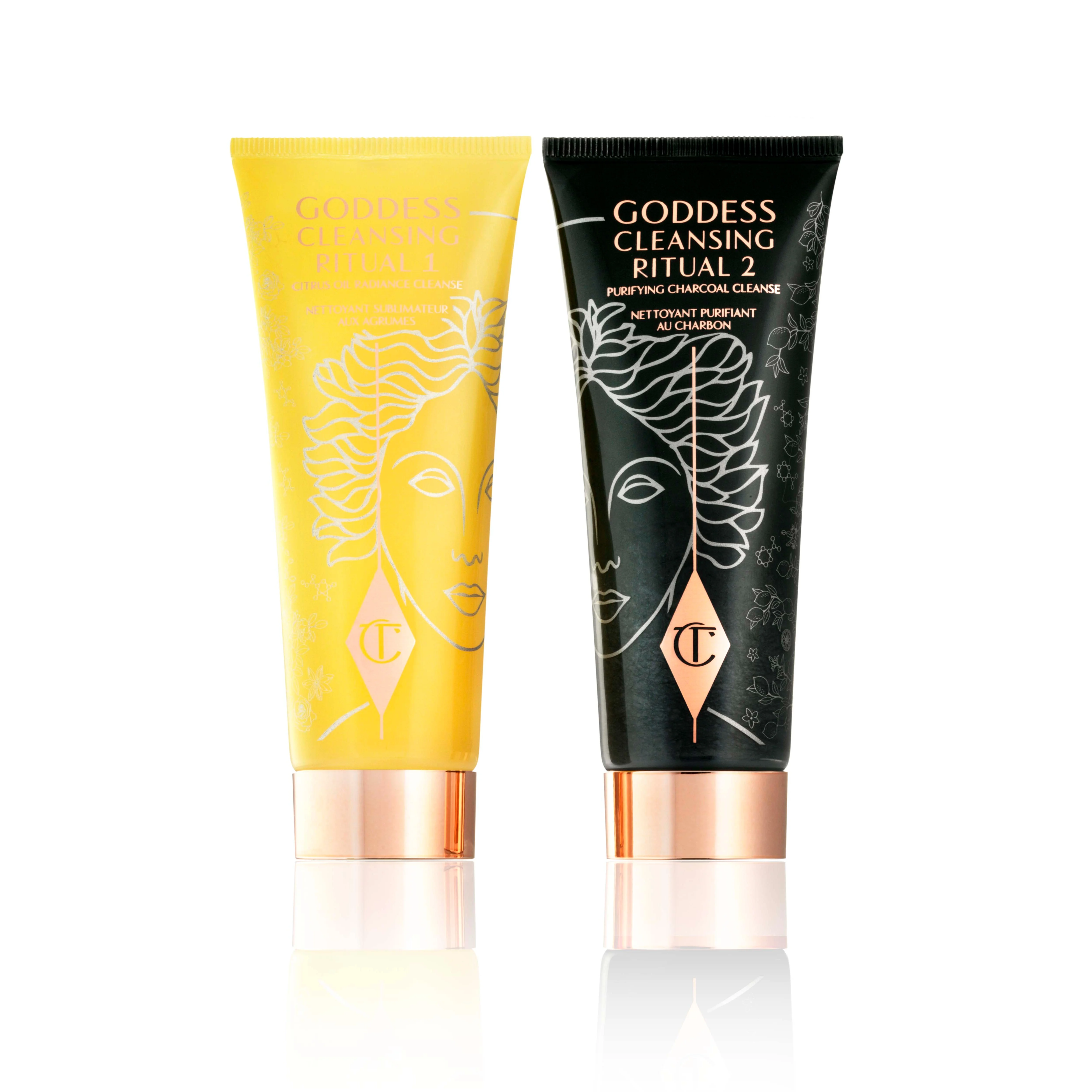 Two facial cleansers, one in lemon-yellow packaging and the other in charcoal-black, with rose-gold coloured lids. 