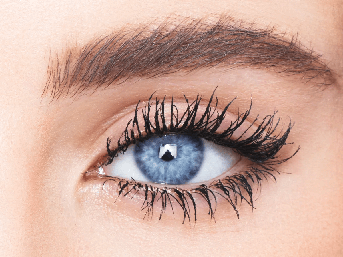 Close up of model wearing Legendary Lashes Volume 2 mascara